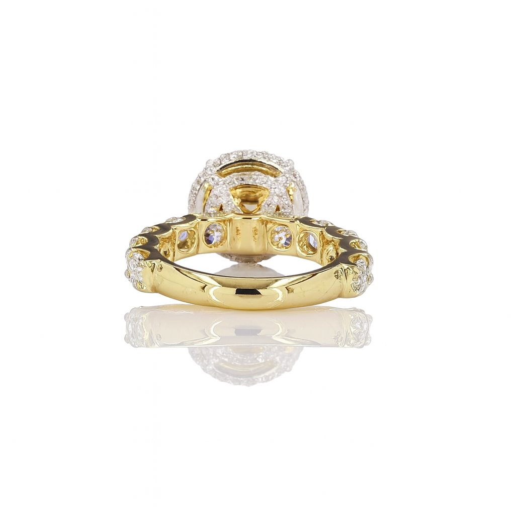 Bague Halo à pierres latérales